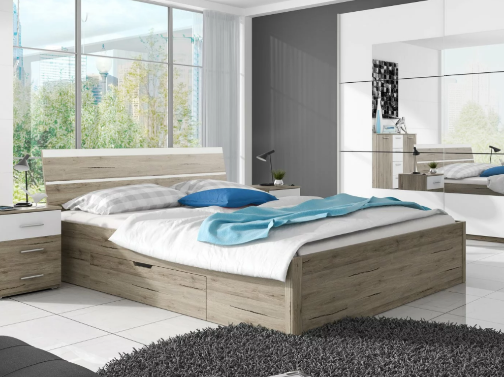 Bračni krevet s dizajnerskim uzglavljem. U okviru skriva praktične ladice koje mogu poslužiti za odlaganje posteljine, jastuka i pokrivača. Ladice se nalaze sa strane.
