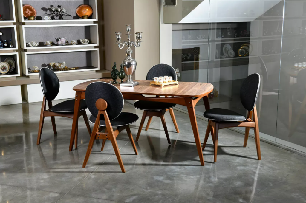 Blagovaonski set - Trish (Orah + Antracit) je moderan i elegantan komad namještaja koji će zasigurno oživjeti vaš blagovaonski prostor. S visinom od 75 cm, širinom od 160 cm i dubinom od 80 cm, pruža dovoljno prostora za cijelu obitelj. Kombinacija boja antracit i noge u orah boji dodaje luksuzan izgled, dok visokokvalitetni materijali osiguravaju dug vijek trajanja